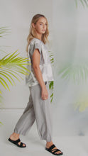 Load and play video in Gallery viewer, NAYA Grapic Print V Neck Top With Contrast Panel NAS26248
